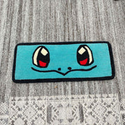Squirtle Pokémon blue handmade wool table top and keyboard rug by SnugRugz in India