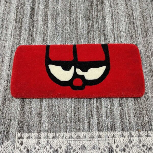 Grumpy Eyes Red Cartoon Keyboard Rug Close up